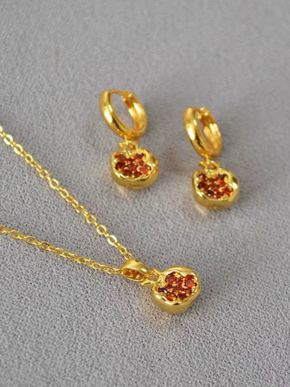 Gold Heart Pendant Necklace and Huggie Earrings Set with Red Crystal Accents